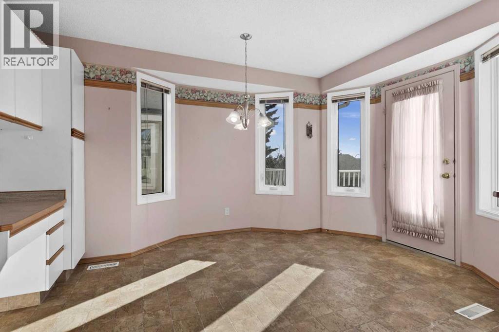 222 Arbour Cliff Close Nw, Calgary, Alberta  T3G 3W7 - Photo 10 - A2286436