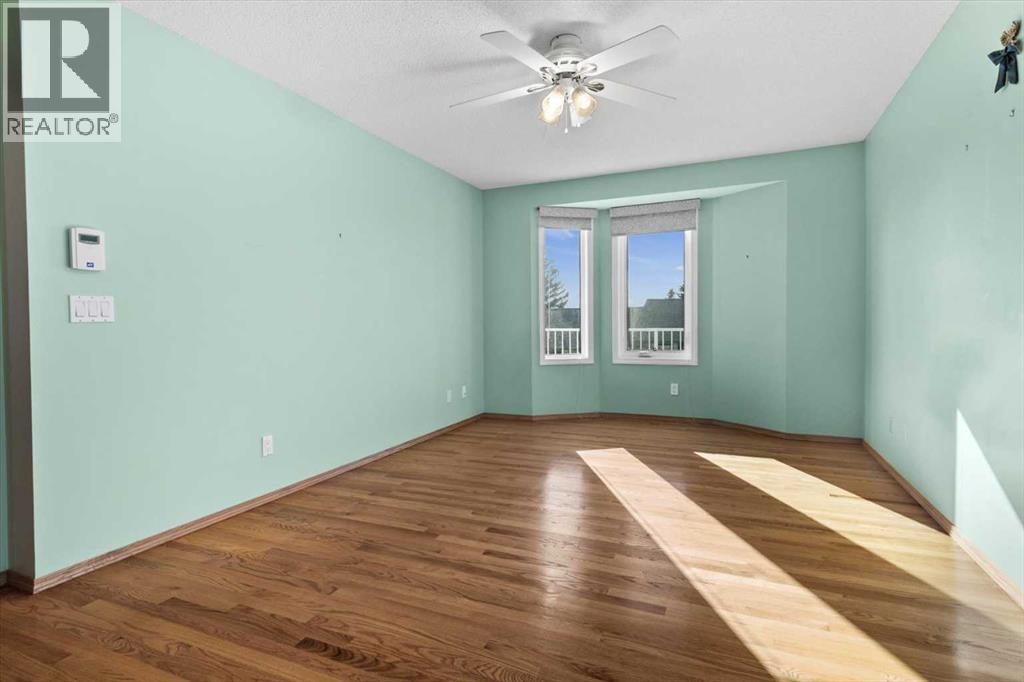 222 Arbour Cliff Close Nw, Calgary, Alberta  T3G 3W7 - Photo 18 - A2286436