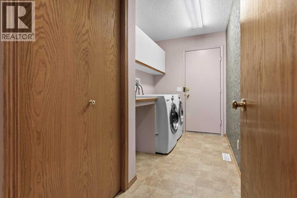 222 Arbour Cliff Close Nw, Calgary, Alberta  T3G 3W7 - Photo 25 - A2286436