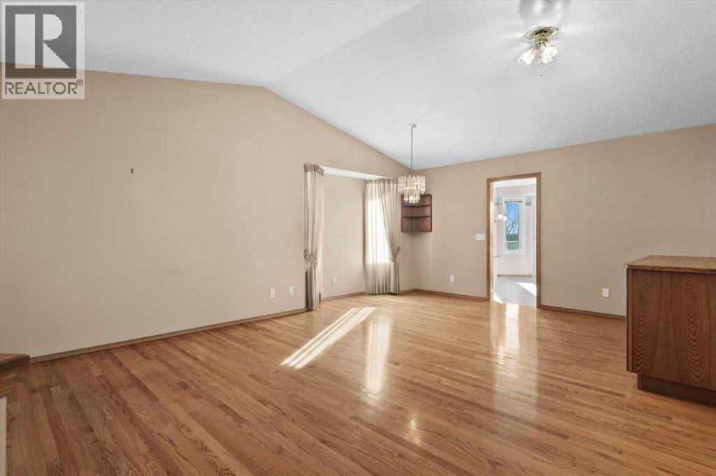 222 Arbour Cliff Close Nw, Calgary, Alberta  T3G 3W7 - Photo 3 - A2286436