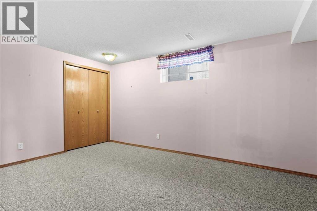 222 Arbour Cliff Close Nw, Calgary, Alberta  T3G 3W7 - Photo 31 - A2286436