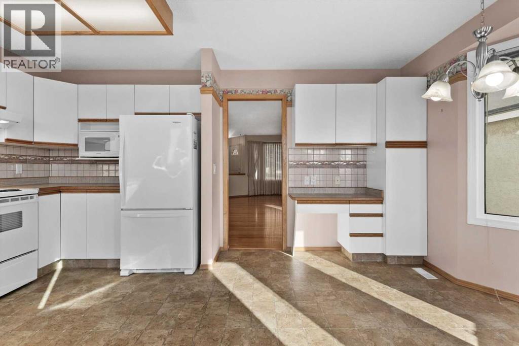 222 Arbour Cliff Close Nw, Calgary, Alberta  T3G 3W7 - Photo 8 - A2286436