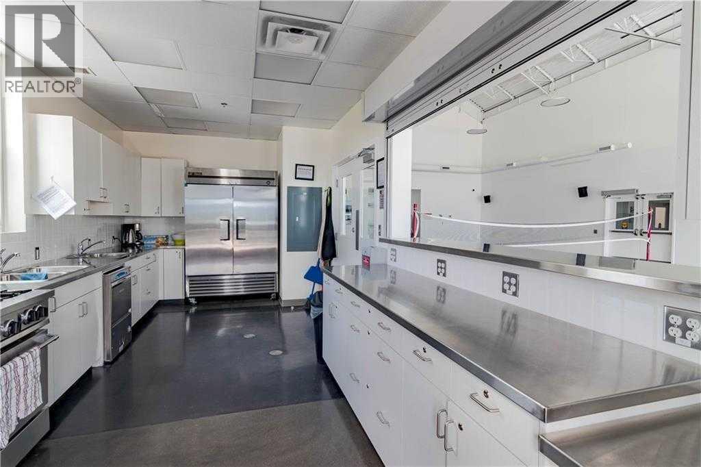 423 Cottageclub Cove, Rural Rocky View County, Alberta  T4C 1B1 - Photo 28 - A2286342