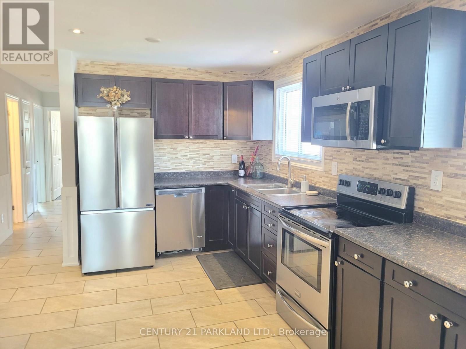 52 Franel Crescent, Toronto, Ontario  M9L 1B7 - Photo 11 - W12665112