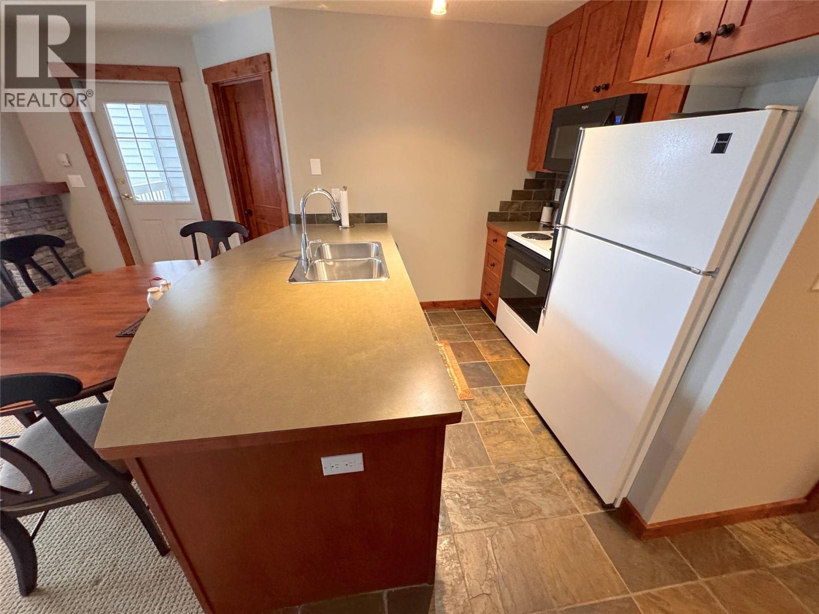 4559 Timberline Crescent Unit# 115, Fernie, British Columbia  V0B 1M6 - Photo 3 - 10375942