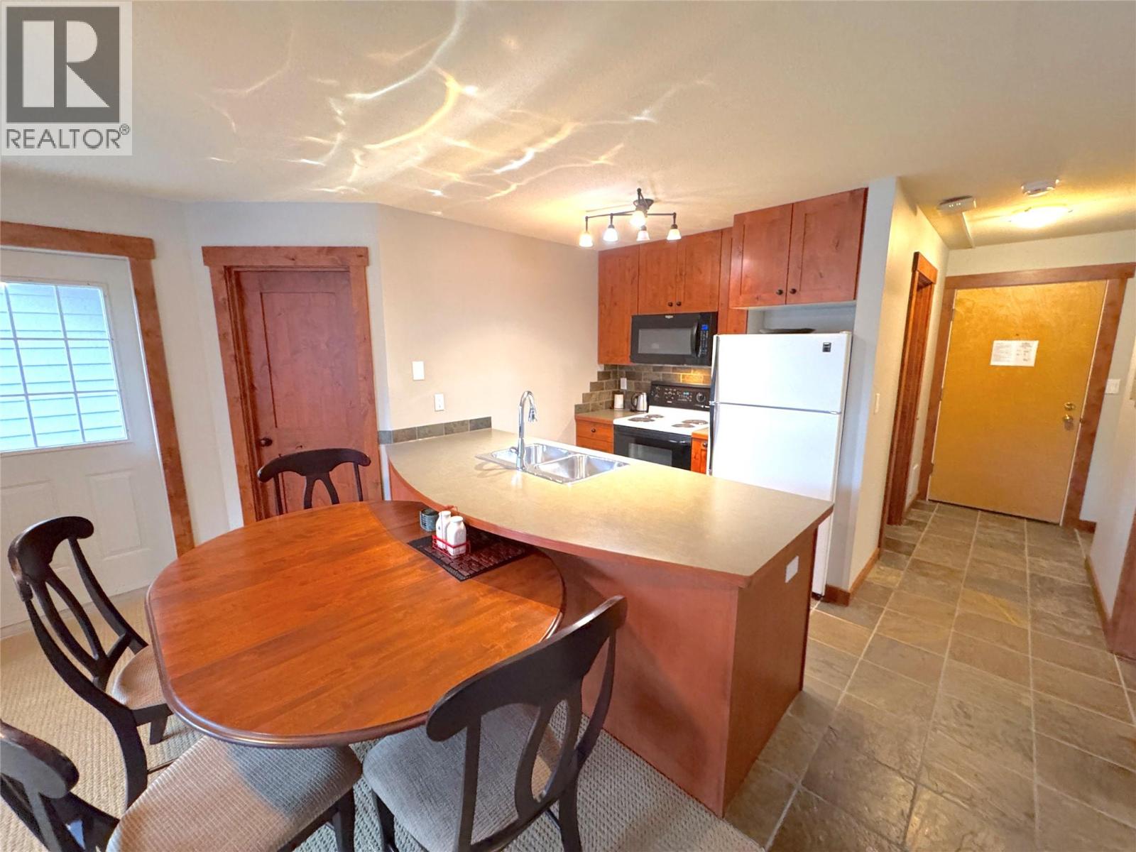 4559 Timberline Crescent Unit# 115, Fernie, British Columbia  V0B 1M6 - Photo 4 - 10375942