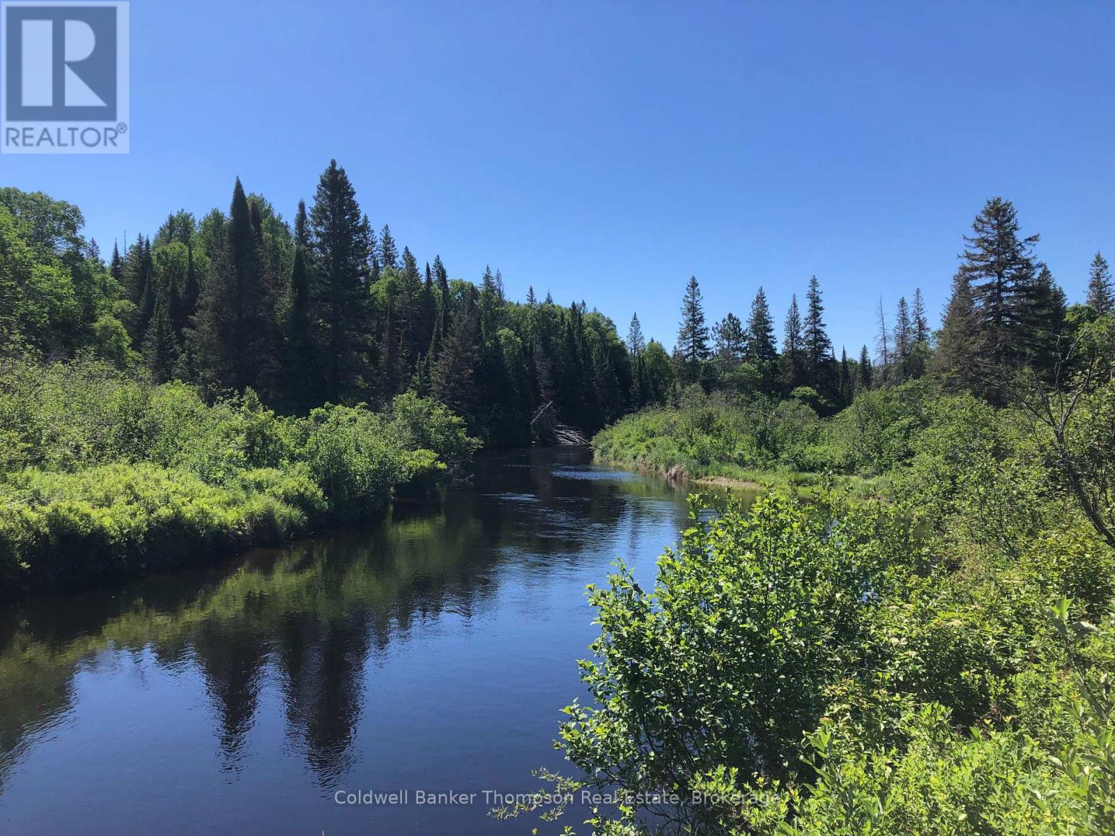 <div class="slider-price">$325,000</div><p>140 Machar River Road, Machar, Ontario</p>