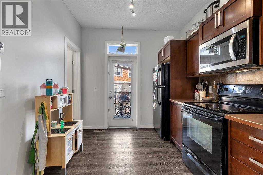 149 New Brighton Point Se, Calgary, Alberta  T2Z 1B6 - Photo 6 - A2283951