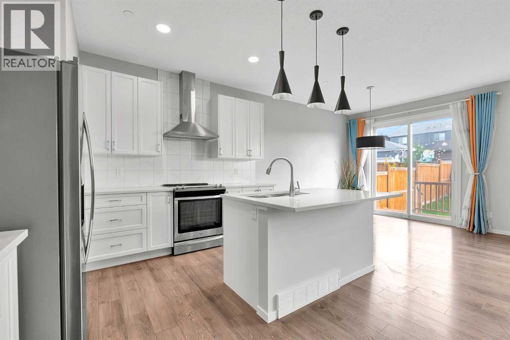 106 Lucas Crescent Nw, Calgary, Alberta  T3P 1M6 - Photo 7 - A2284434