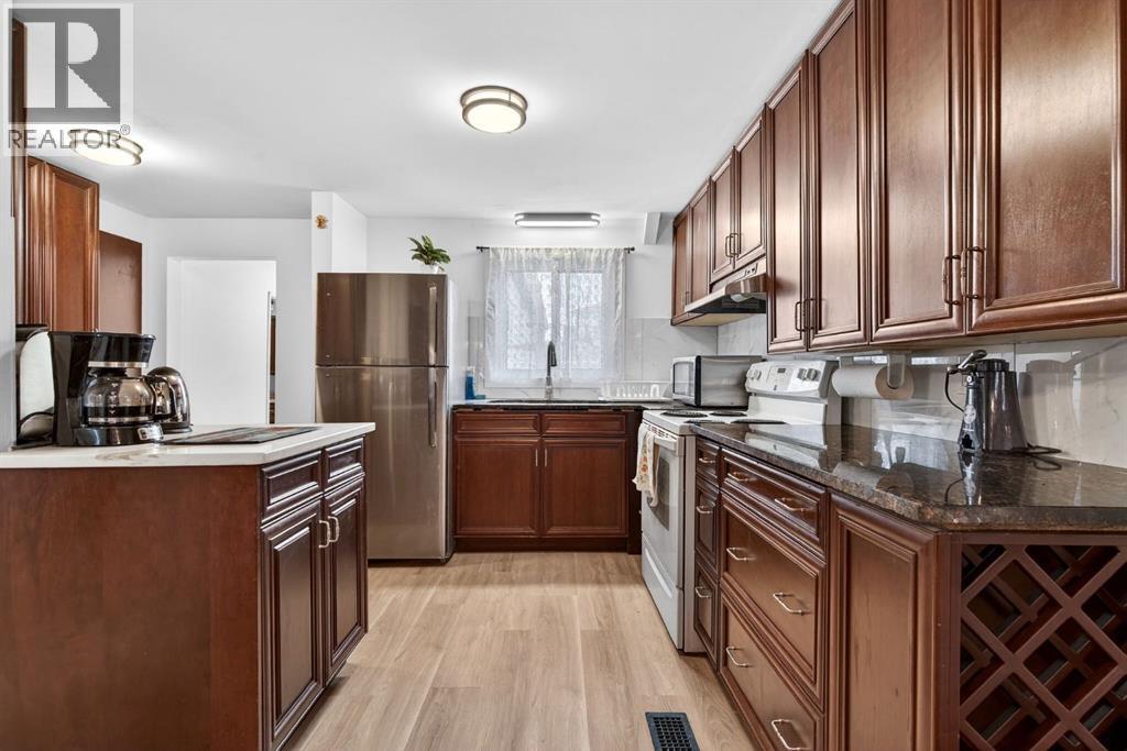 209 Sunset Boulevard Sw, Diamond Valley, Alberta  T0L 2A0 - Photo 14 - A2286600