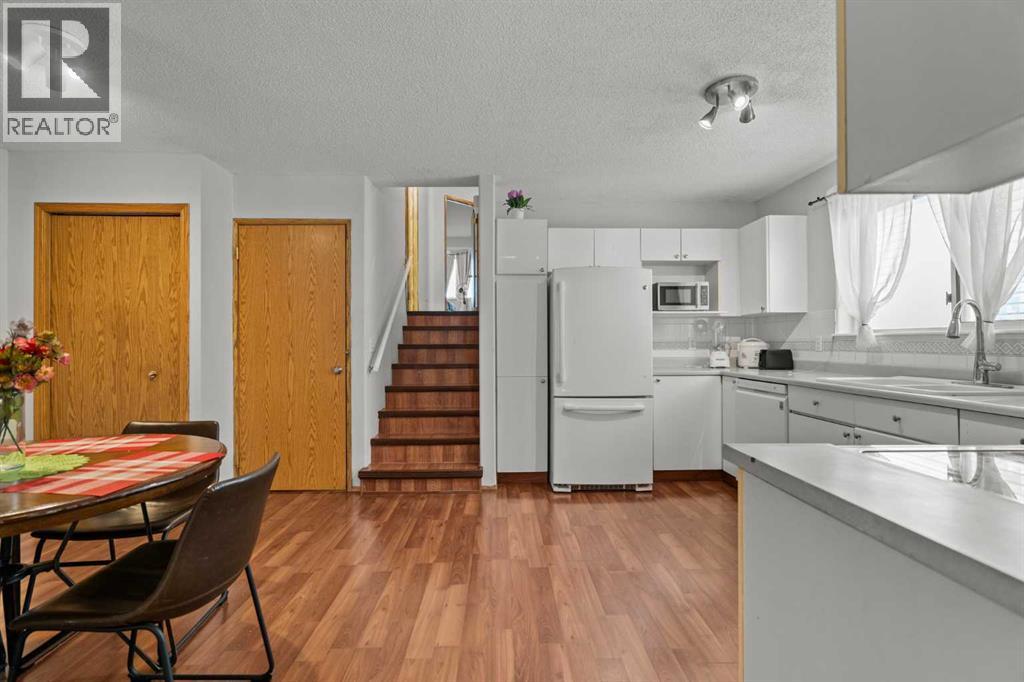 6938 Laguna Way Ne, Calgary, Alberta  T1Y 6W2 - Photo 10 - A2271088