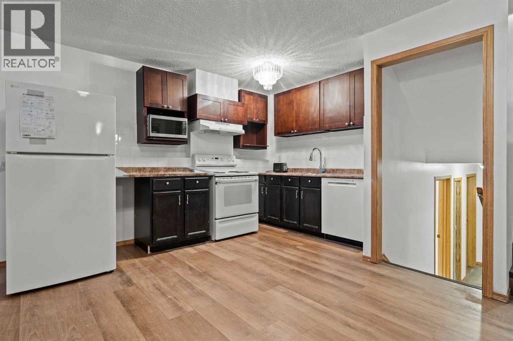 6938 Laguna Way Ne, Calgary, Alberta  T1Y 6W2 - Photo 22 - A2271088