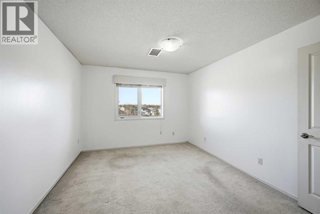 404, 300 Edwards Way Nw, Airdrie, Alberta  T4B 3B4 - Photo 22 - A2286880