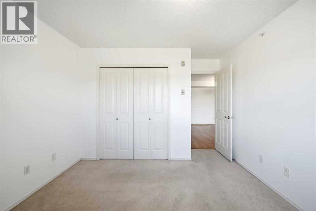 404, 300 Edwards Way Nw, Airdrie, Alberta  T4B 3B4 - Photo 28 - A2286880
