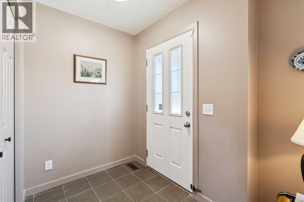 43 Sunset Road, Cochrane, Alberta  T4C 0W3 - Photo 3 - A2286348