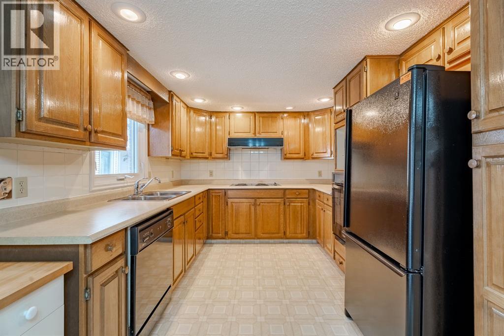 9, 275 Woodridge Drive Sw, Calgary, Alberta  T2W 3S2 - Photo 16 - A2280072