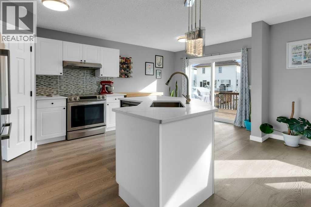 11185 Hidden Valley Drive Nw, Calgary, Alberta  T3A 6C7 - Photo 7 - A2287079