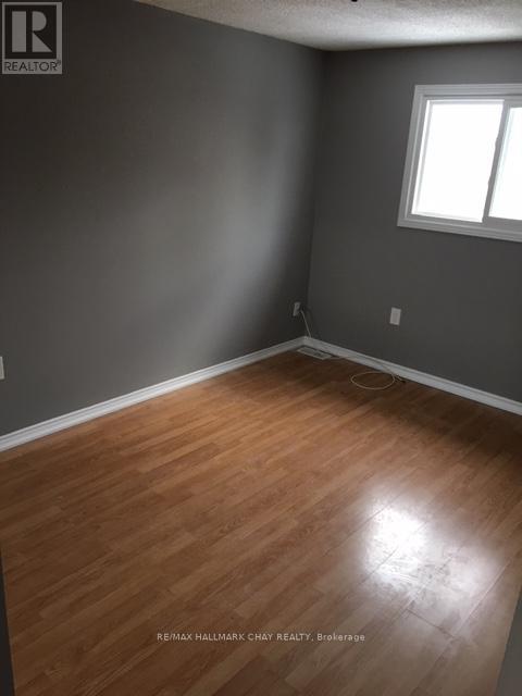 61 Corbett Drive, Barrie (Grove East), Ontario  L4M 5V6 - Photo 7 - S12798364