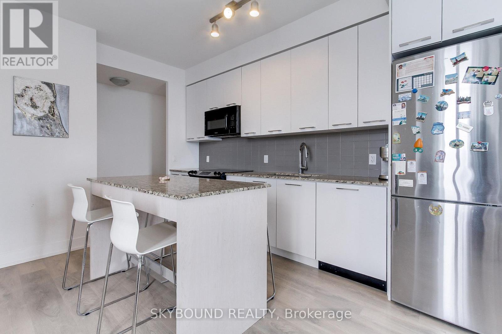 1007 - 9471 Yonge Street, Richmond Hill, Ontario L4C 0Z5 - Photo 5 - N12798976