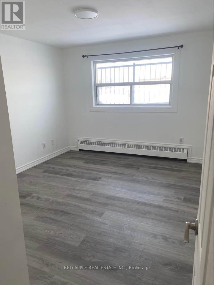 211 Milvan Drive, Toronto, Ontario  M9L 2A3 - Photo 6 - W12799656