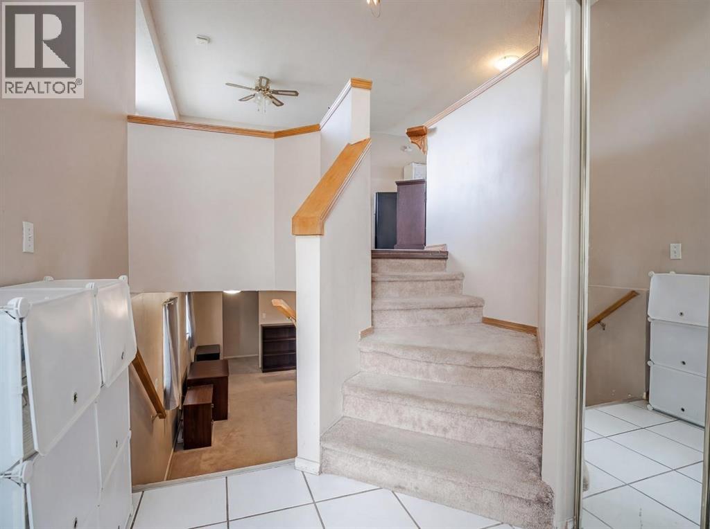 206 Saratoga Close Ne, Calgary, Alberta  T1Y 7A1 - Photo 4 - A2287199