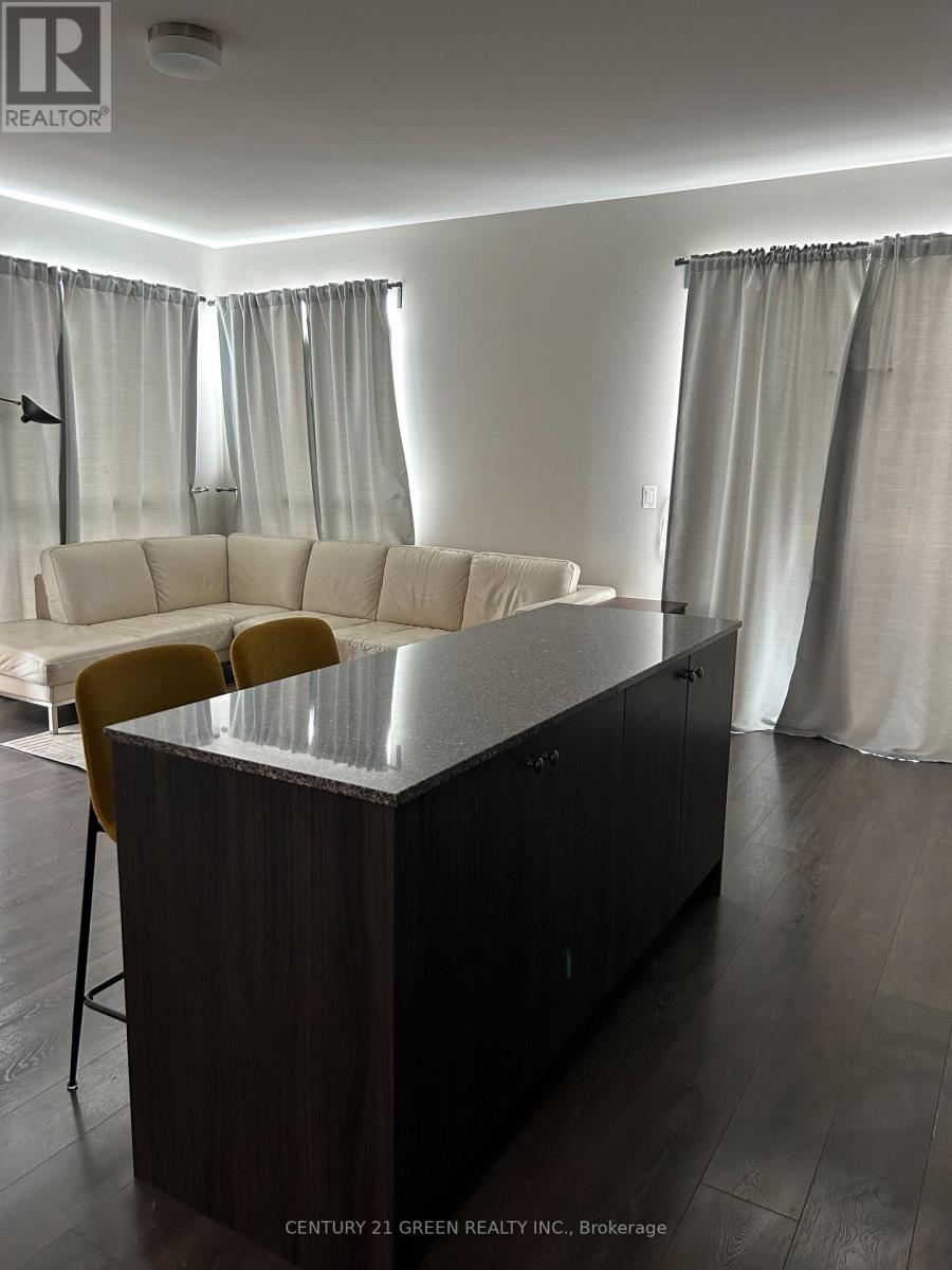 403 - 210 Sabina Drive, Oakville, Ontario  L6H 0W6 - Photo 3 - W12794814