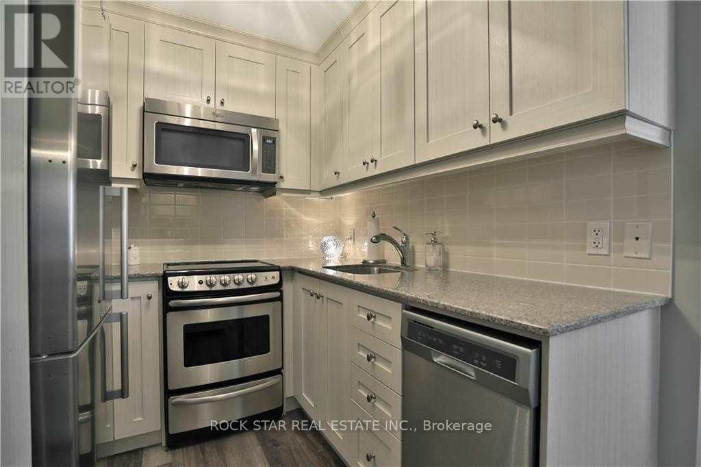 406 - 73 Washington Avenue, Oakville (Co Central), Ontario  L6K 1W5 - Photo 9 - W12800316