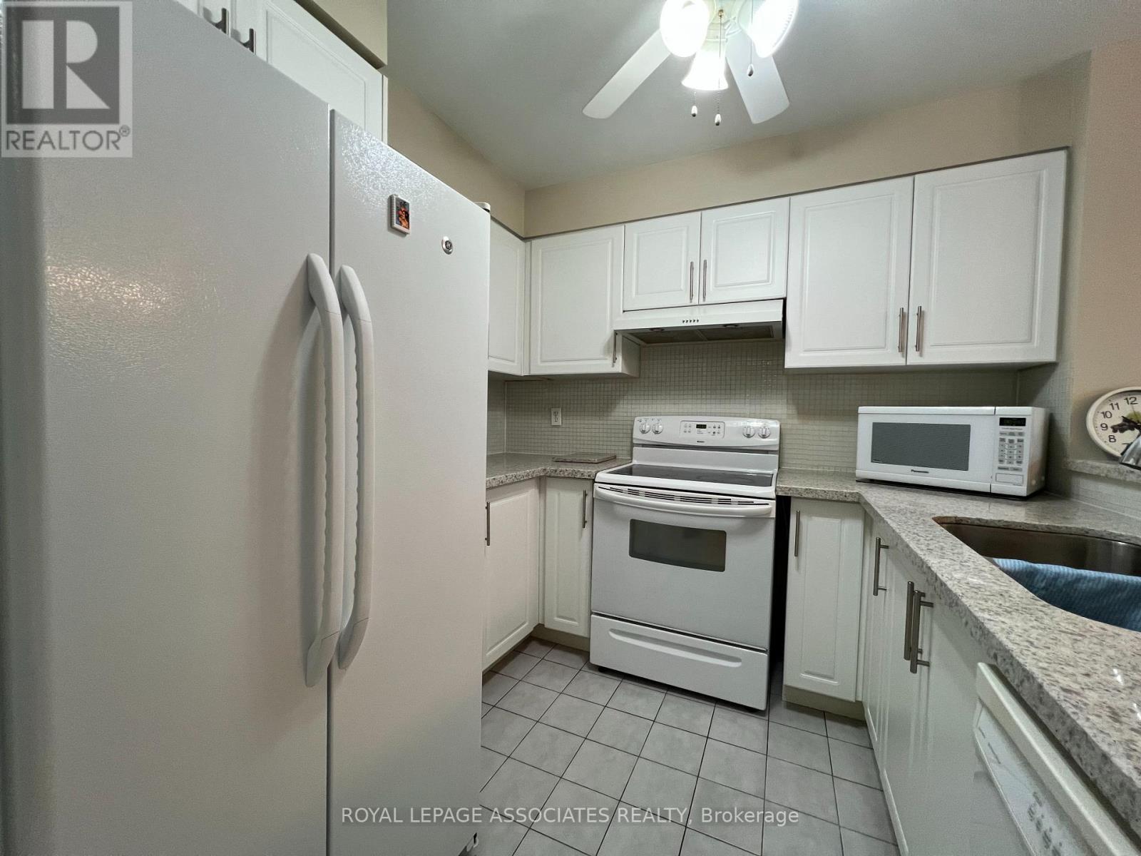 402 - 2177 Burnhamthorpe Road W, Mississauga, Ontario  L5L 5P9 - Photo 4 - W12801160