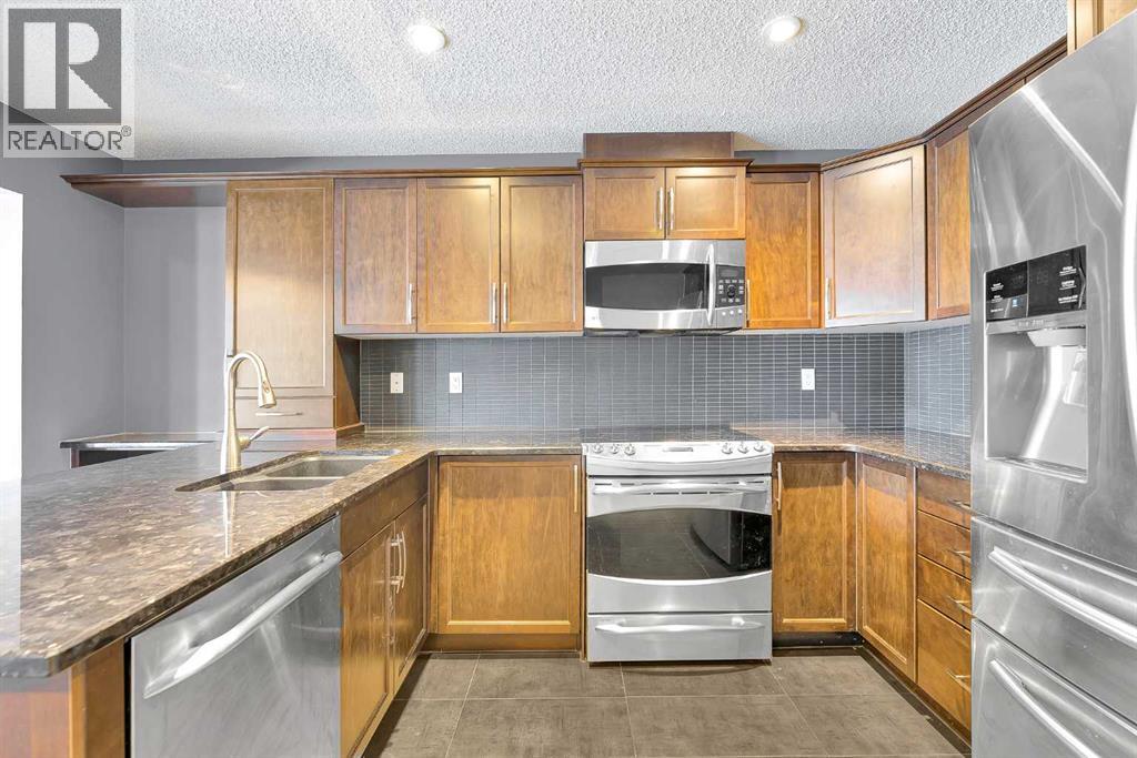 157 Windstone Avenue Sw, Airdrie, Alberta  T4B 3R3 - Photo 6 - A2276923