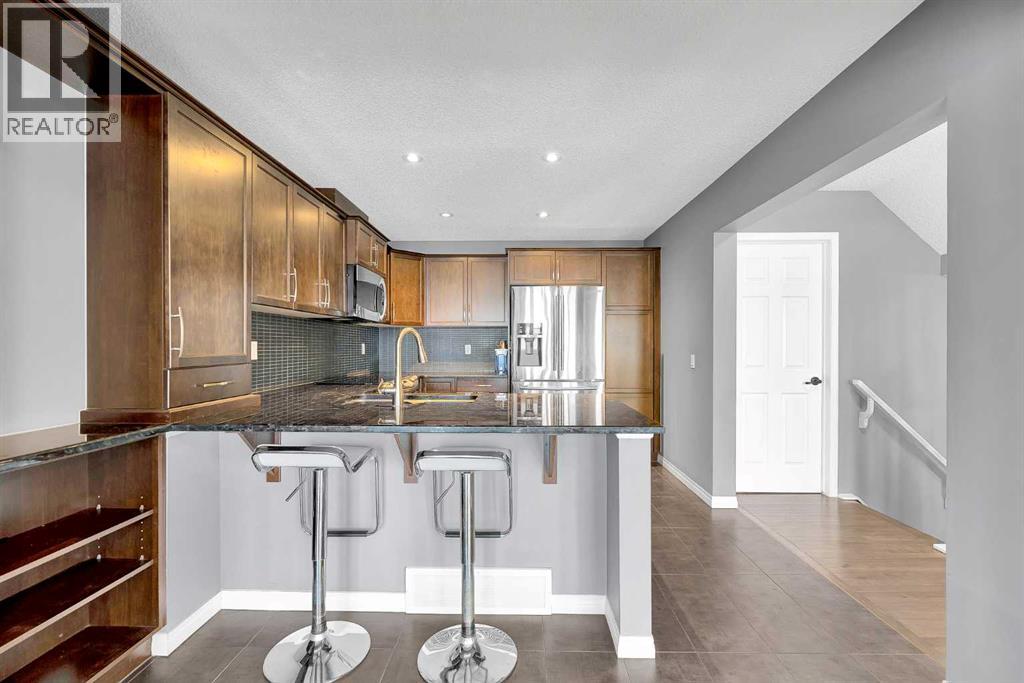 157 Windstone Avenue Sw, Airdrie, Alberta  T4B 3R3 - Photo 7 - A2276923