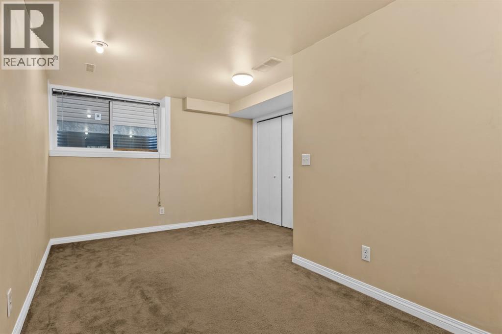 4416 Quentin Court Sw, Calgary, Alberta  T2T 6B9 - Photo 28 - A2286415