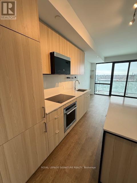 711 - 251 Masonry Way, Mississauga, Ontario  L5H 0B3 - Photo 2 - W12802314