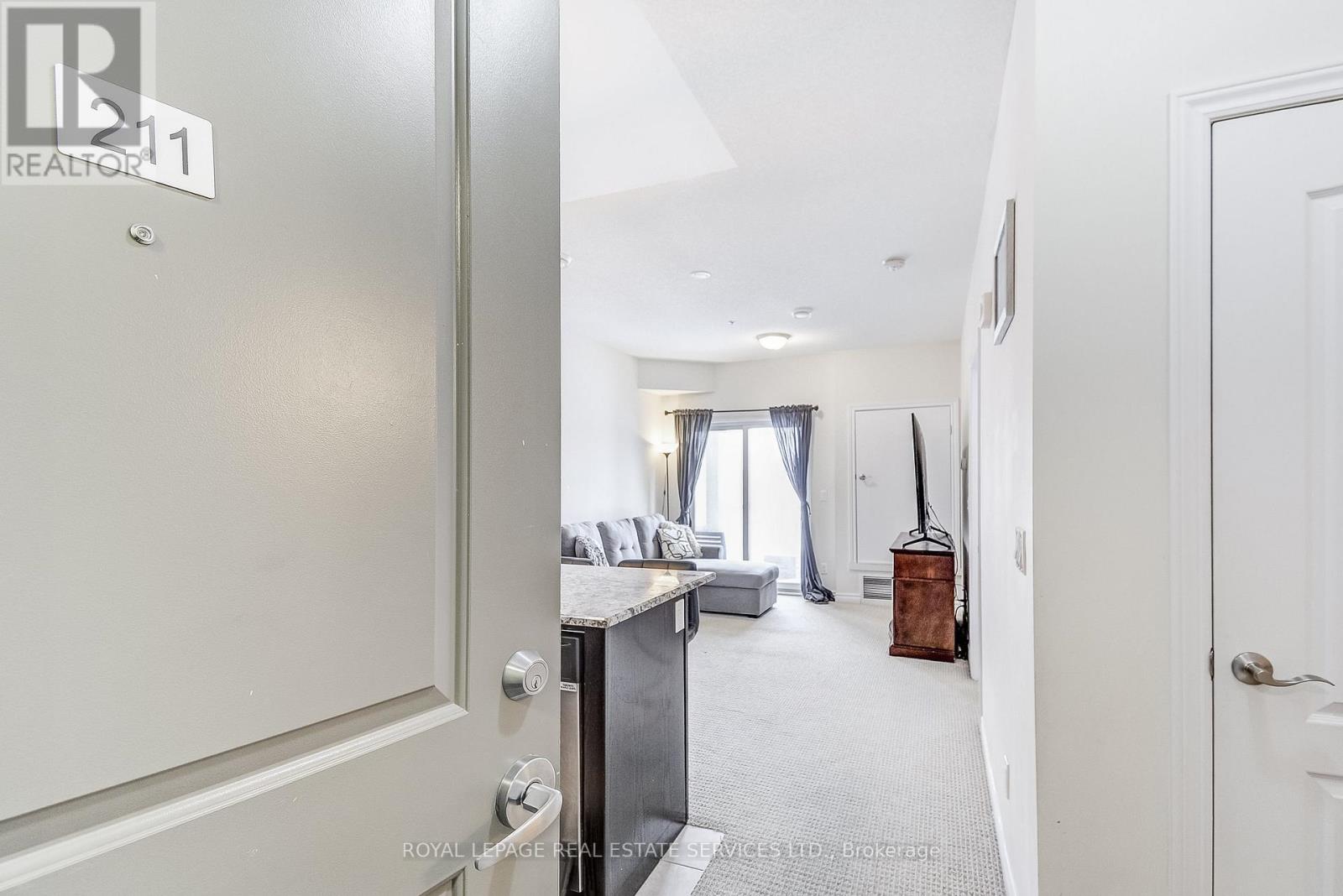 211 - 1360 Costigan Road, Milton, Ontario  L9T 0Y8 - Photo 2 - W12802512