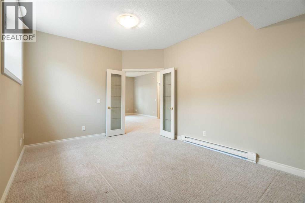 114, 1000 Glenhaven Way, Cochrane, Alberta  T4C 1Y9 - Photo 31 - A2287184