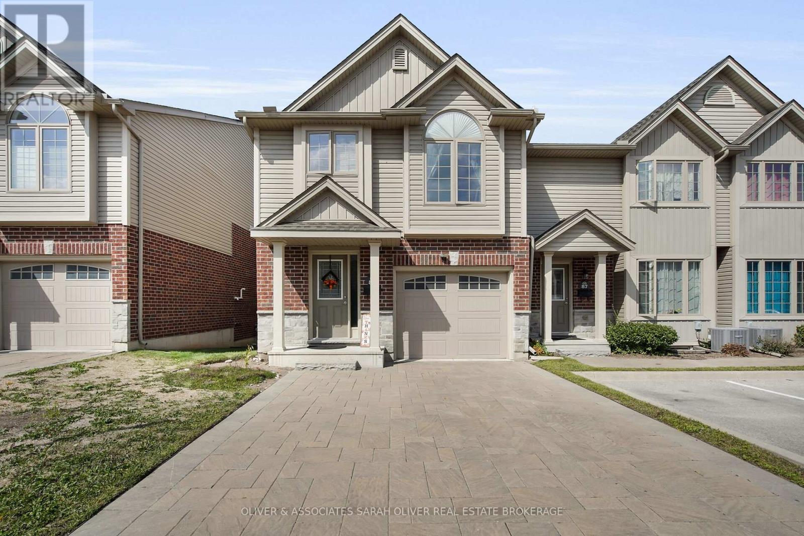 Nothing short of sophisticated affordability, exceptional quality and design located at the edge of North London's popular neighborhood known as North Ridge. This POPULAR WESTERDAM, offers 1747 sq ft of quality living space. End Unit. Multi level floor plan w/Single car attached garage, double wide driveway & inside entry,3 bedrooms, large master w/ 3pc Ensuite, finished family room with walkout/separate entrance , open concept kitchen/living room, 16 x 12 deck backing on to a beautiful RAVINE, high quality standard finishes and upgrades like Plank Laminate floors, ceramic tile, quartz counters, , upgraded carpet and under-pad. 3 Stainless appliances This unit has immediate possession and low condo fees of only $278.00 per month. Great location, close to UWO and University Hospital, Fanshawe College and London Airport. (id:48254)