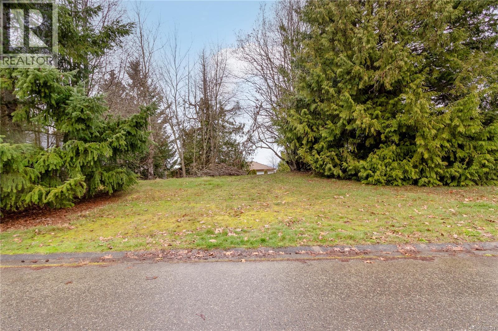 881 Fairways Dr, Qualicum Beach, British Columbia V9K 2J1 - Photo 7 - 1026324