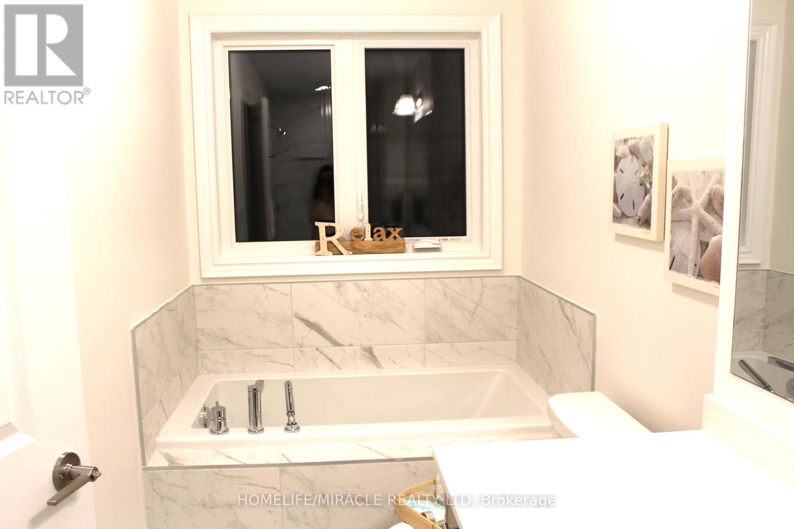 94 Bermondsey Way, Brampton, Ontario  L6Y 6K9 - Photo 19 - W12803270