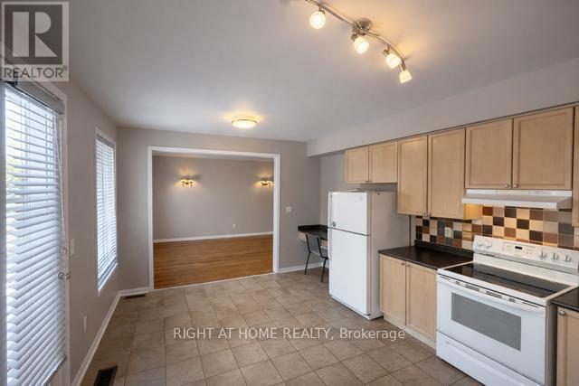 5923 Blue Spruce Avenue, Burlington, Ontario  L7L 6T3 - Photo 6 - W12803288