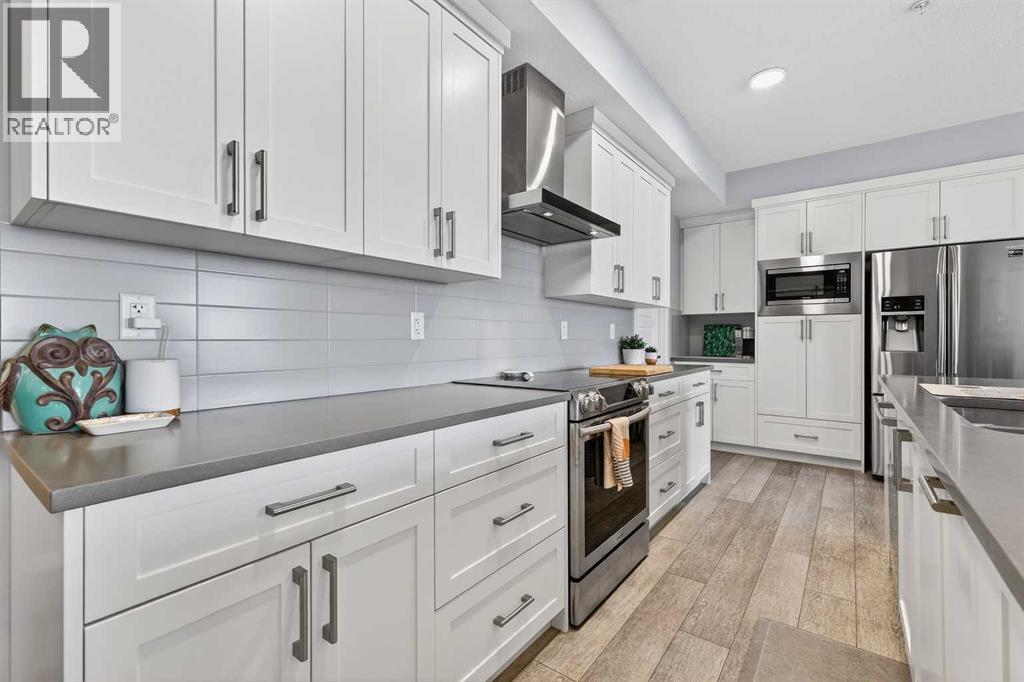 311, 360 Harvest Hills Common Ne, Calgary, Alberta  T3K 2N1 - Photo 5 - A2286926