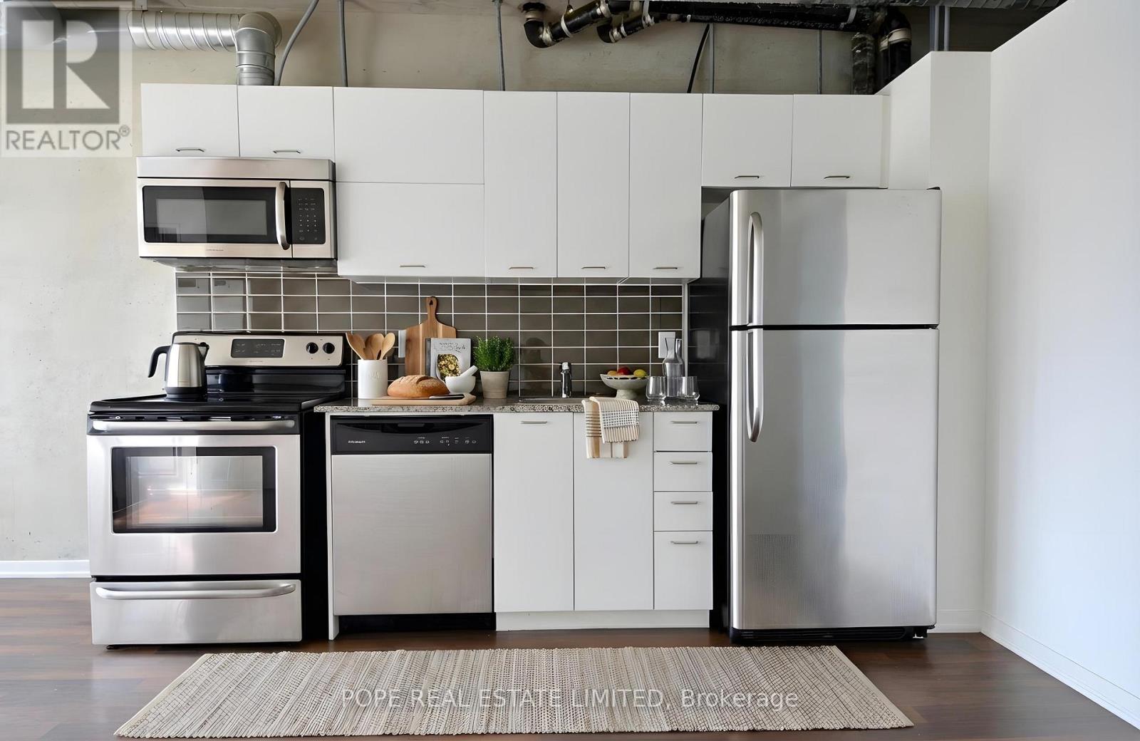 312 - 38 Joe Shuster Way, Toronto, Ontario  M6K 0A5 - Photo 2 - W12803388