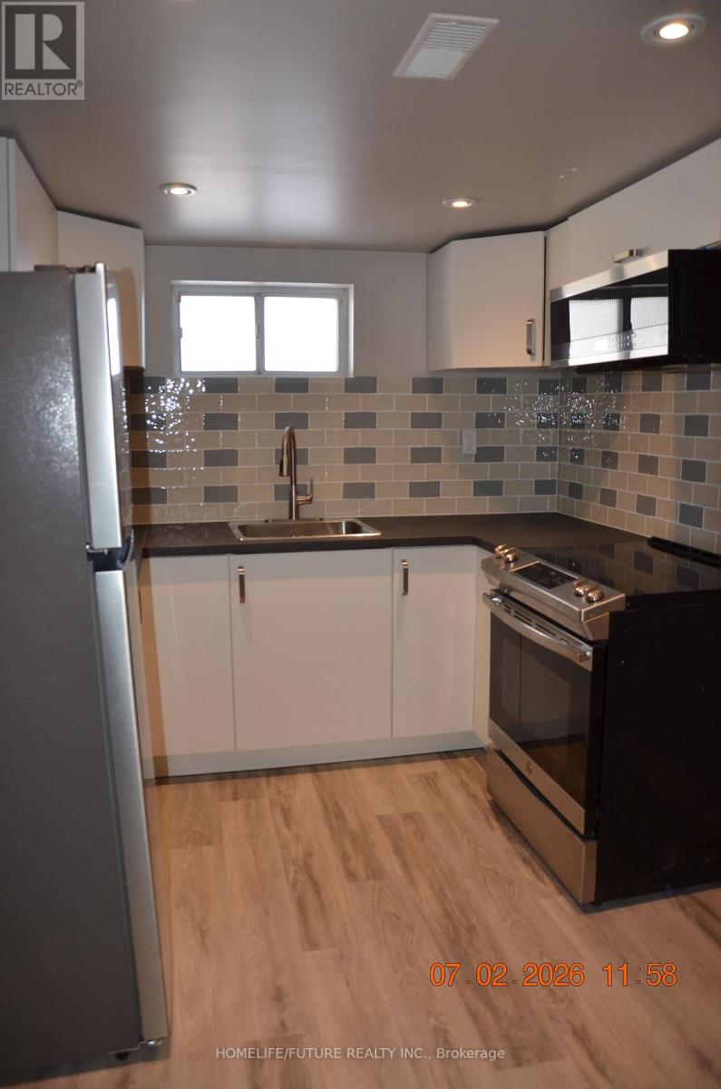 11 Coppermill Drive, Toronto, Ontario  M9W 3Z1 - Photo 2 - W12803562