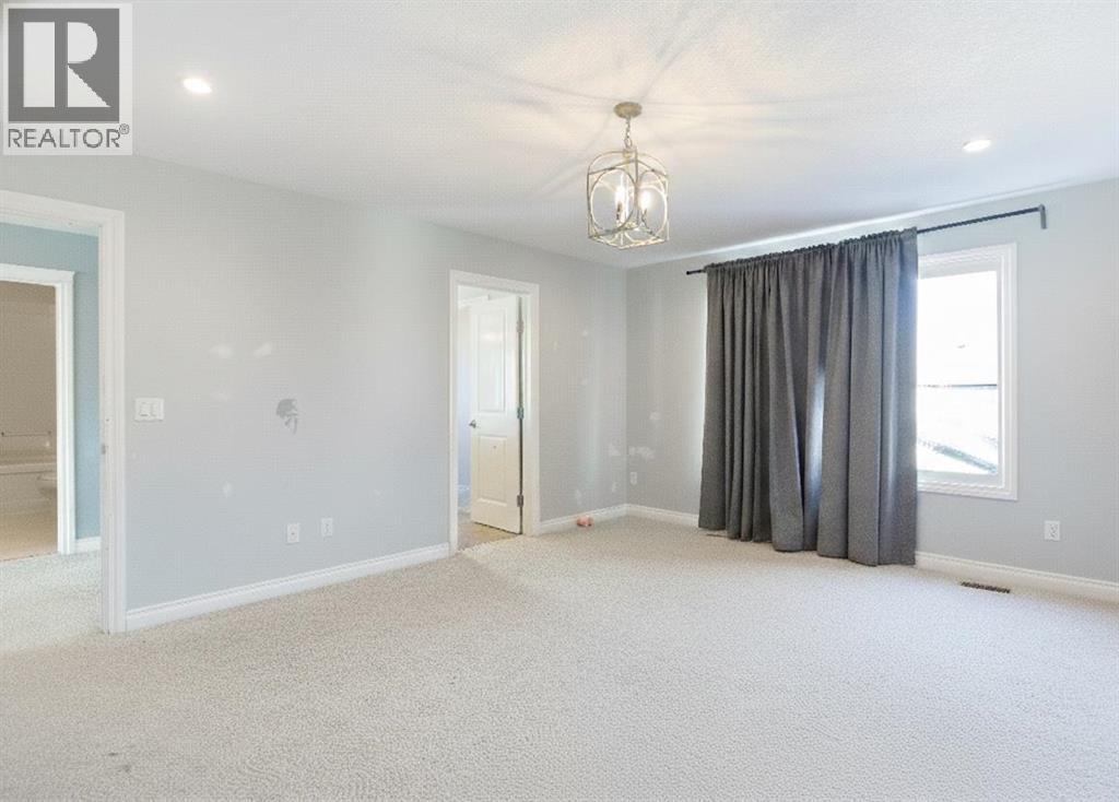 56 Baywater Court Sw, Airdrie, Alberta  T4B 0A9 - Photo 24 - A2286050