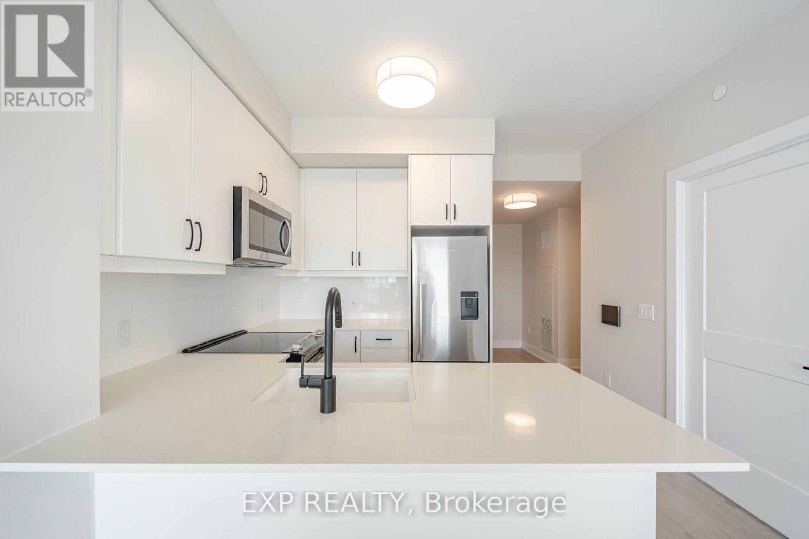 1109 - 3220 William Coltson Avenue, Oakville, Ontario  L6H 7C2 - Photo 4 - W12800828