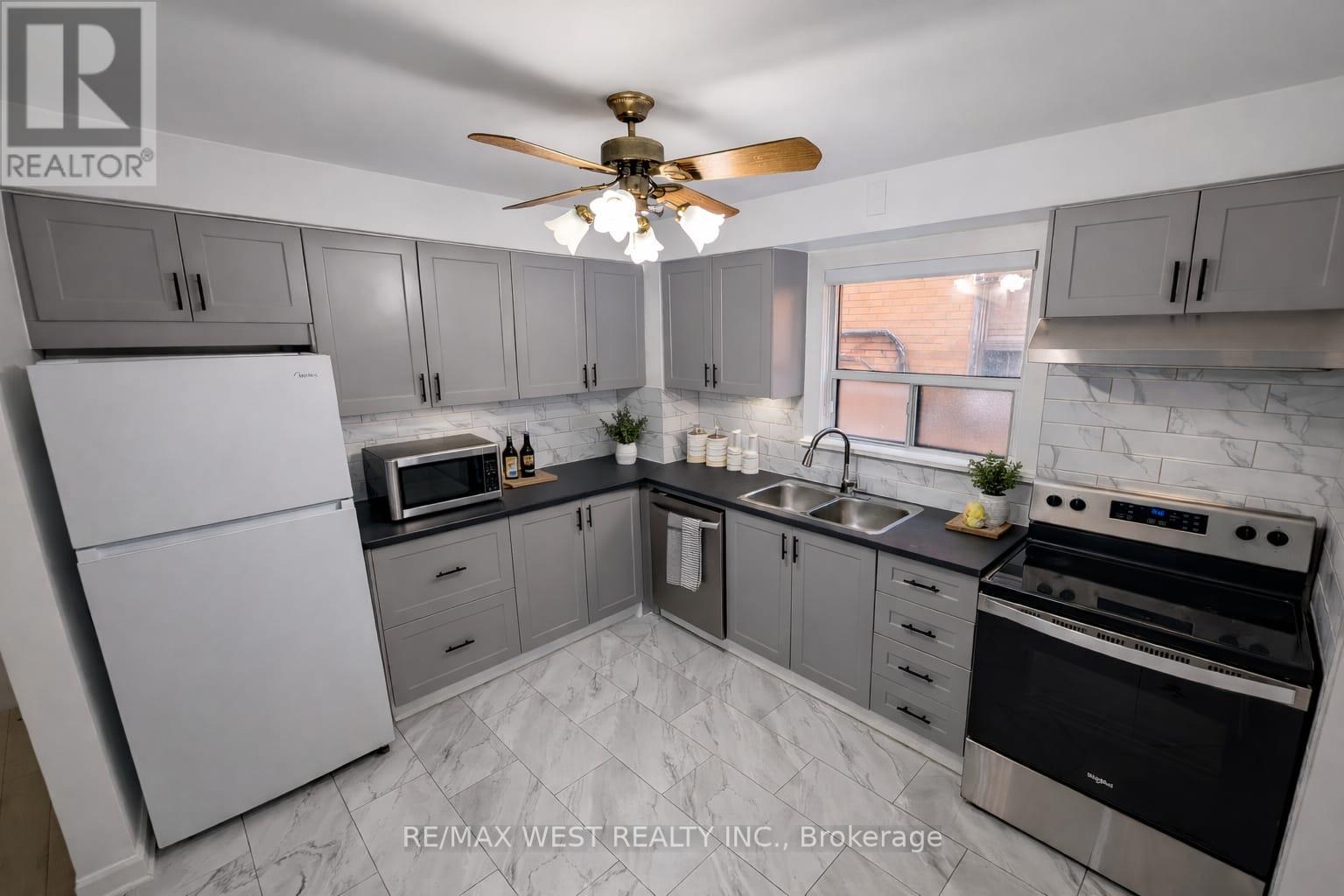 2 - 106 Kirknewton Road, Toronto, Ontario  M6E 3Y2 - Photo 2 - W12804456