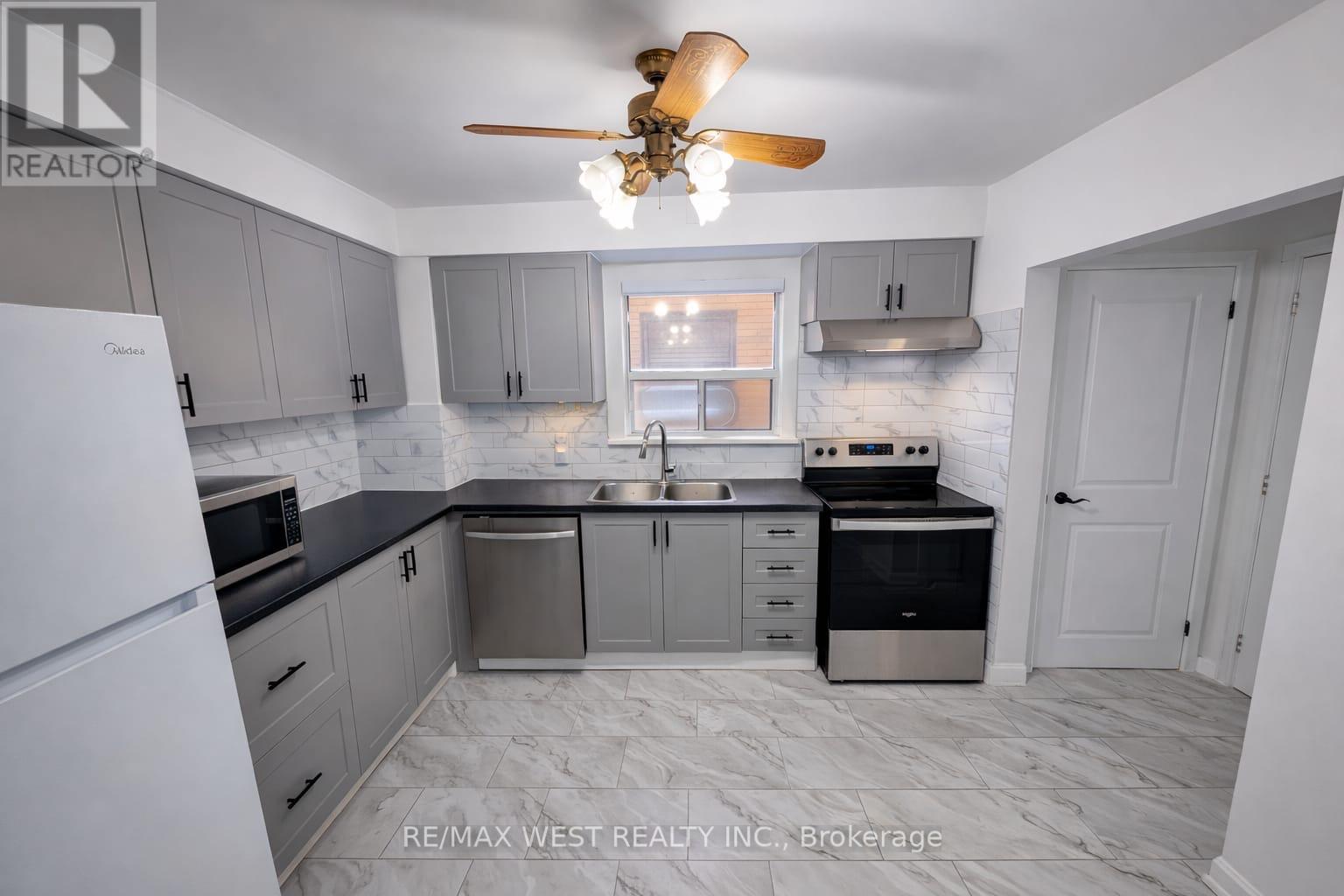 2 - 106 Kirknewton Road, Toronto, Ontario  M6E 3Y2 - Photo 3 - W12804456