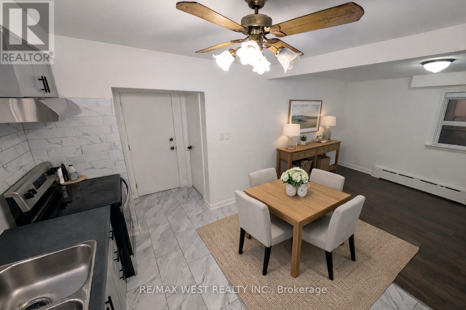 2 - 106 Kirknewton Road, Toronto, Ontario  M6E 3Y2 - Photo 4 - W12804456