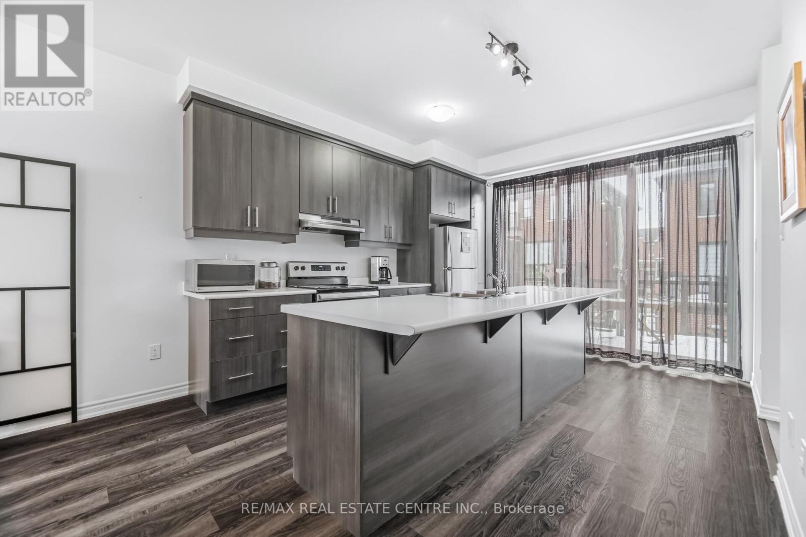 #18 - 975 Whitlock Avenue, Milton, Ontario  L9E 1S9 - Photo 14 - W12804806