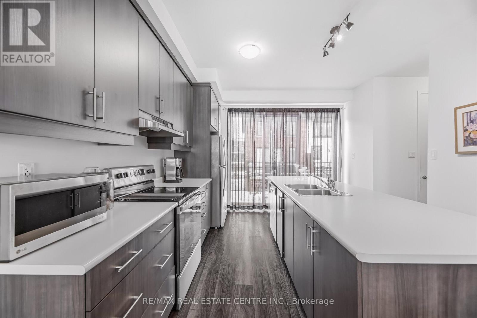 #18 - 975 Whitlock Avenue, Milton, Ontario  L9E 1S9 - Photo 15 - W12804806