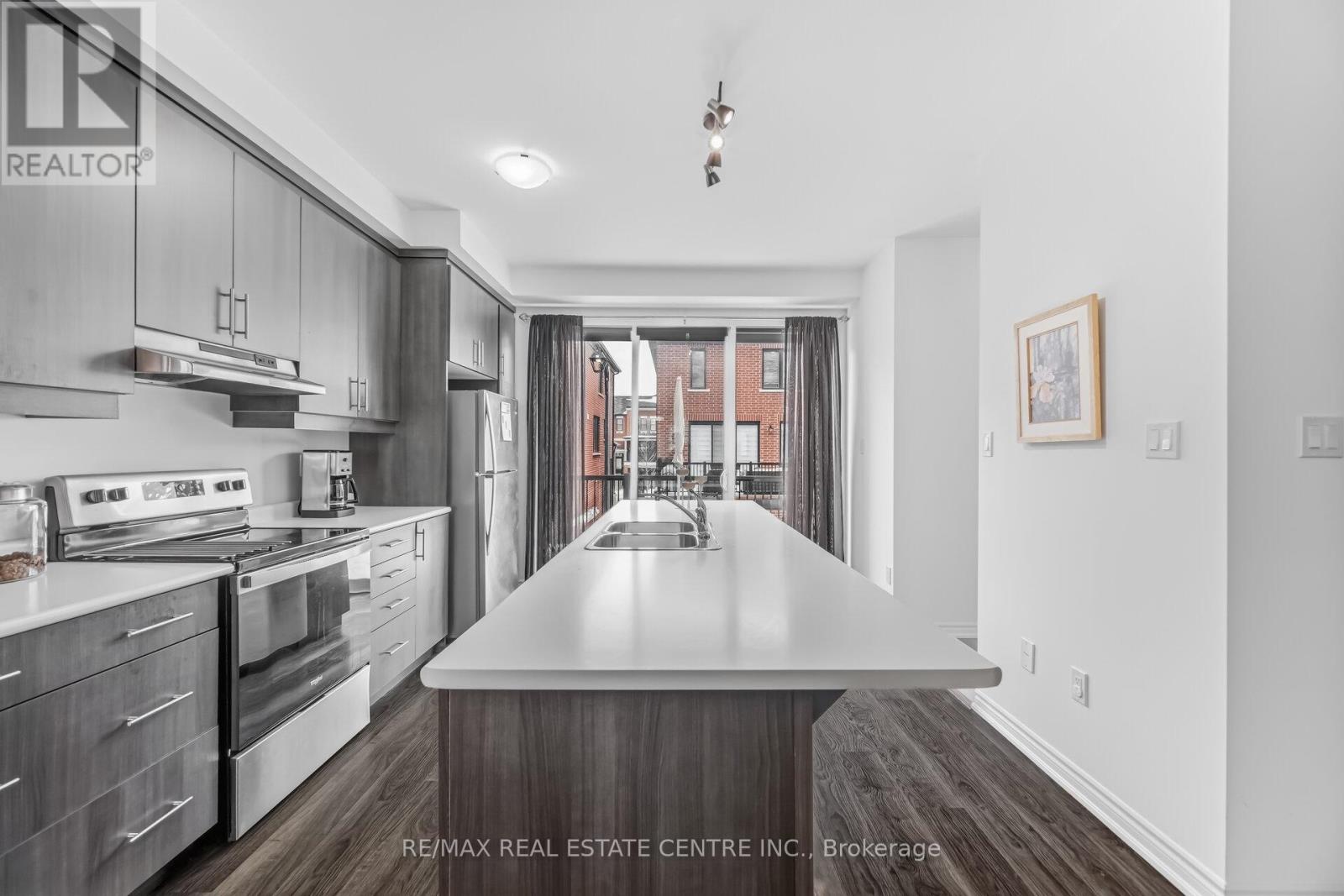 #18 - 975 Whitlock Avenue, Milton, Ontario  L9E 1S9 - Photo 18 - W12804806