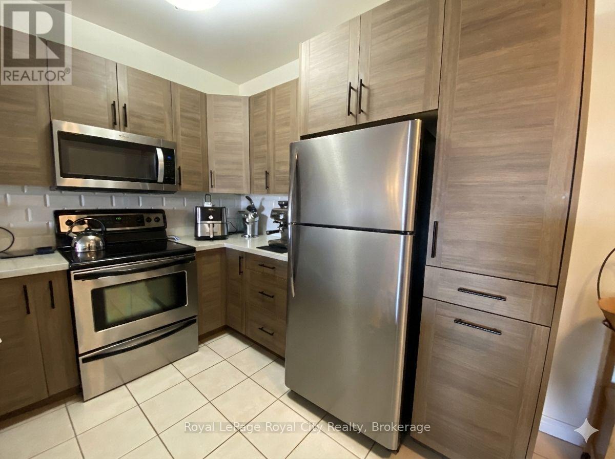805 - 60 Wyndham Street S, Guelph (St. Patrick's Ward), Ontario  N1E 7H7 - Photo 2 - X12805198